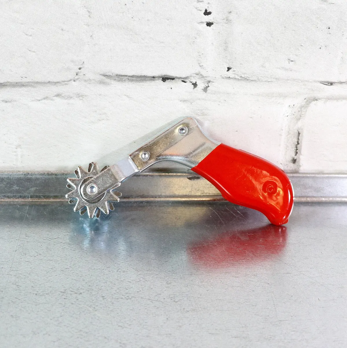 Malco Buffing Spur 1